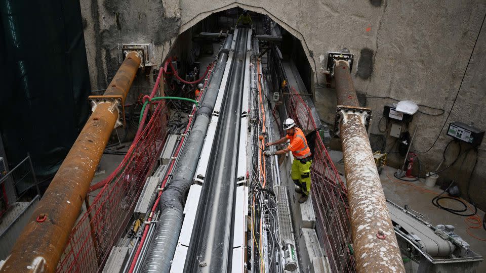 Workers with a tunnel boring machine at the Seine-Valenton wastewater treatment plant. - Emmanuel Dunand/AFP/Getty Images