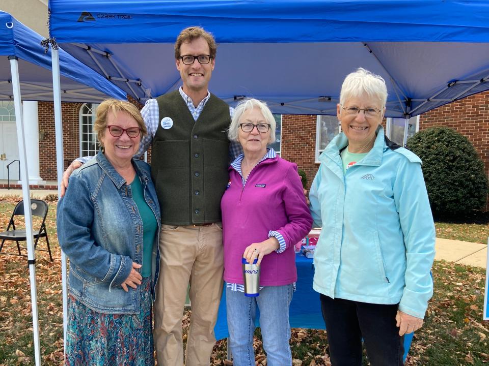 Volunteer greeters outside Ward 5 at Memorial Baptist Church on 224 Taylor St. to help voters when they arrive on Tuesday morning, Nov. 7, 2023.