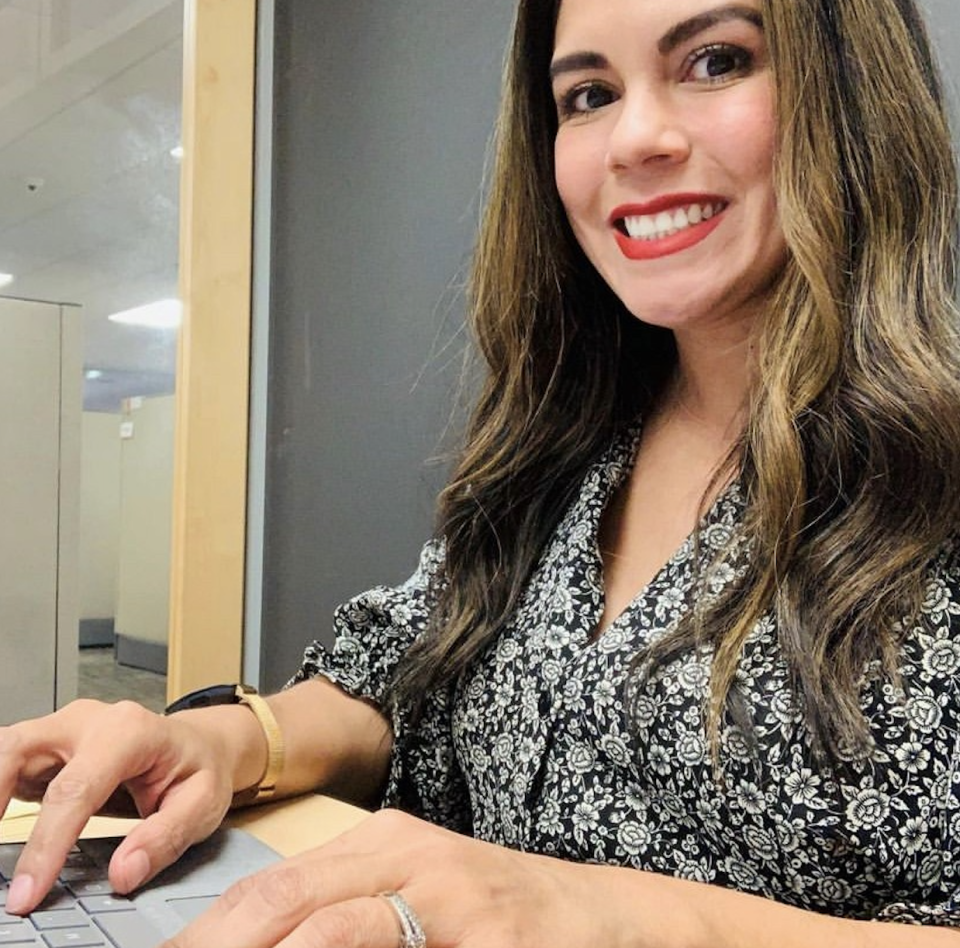 Pamela Cone works for Carenet Health in San Antonio and returned to the office in early April. She says there's more "synergy" to working with colleagues in an office.