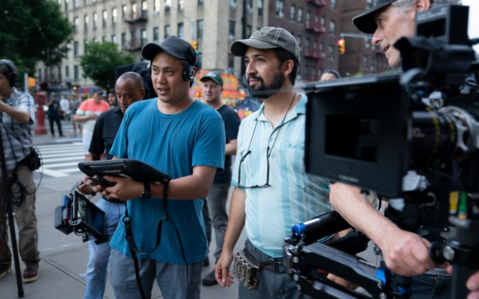 Director John M Chu and Lin-Manuel Miranda on the New York set - Warner Bros