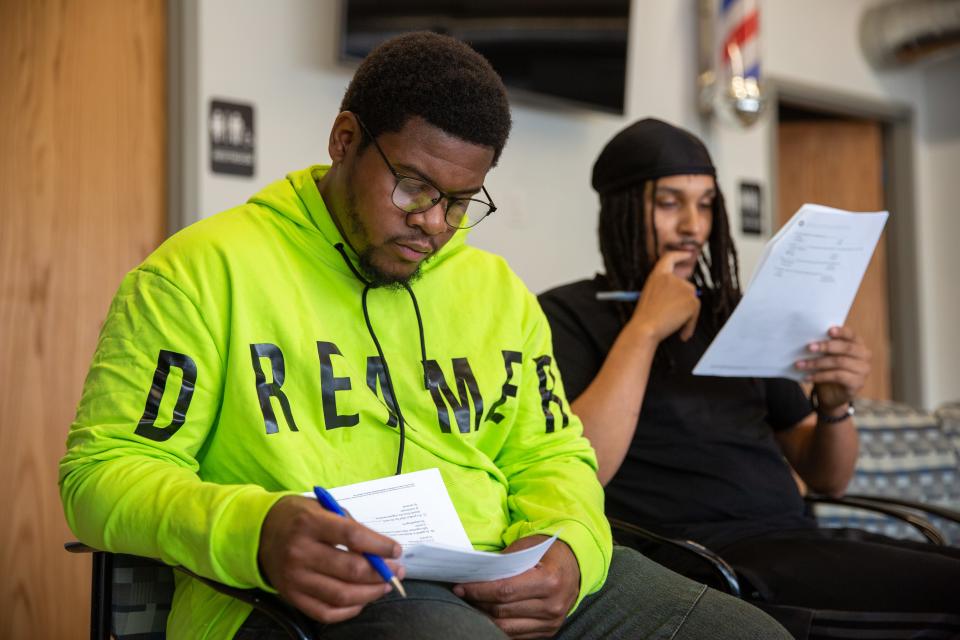 Jaden Wilson takes a test at Clippernomics Academy of Hairstyling, Friday, July 8, 2022.