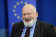 Executive Vice President of European Union Green Deal Frans Timmermans smiles as he speaks during an interview with The Associated Press in Jakarta, Indonesia, Monday, Oct. 18, 2021. Timmermans spoke to The Associated Press on Monday in Jakarta ahead of a key climate summit that starts in Glasgow, Scotland, on Oct. 31. Many environmentalists say the U.N. summit, known as COP26, represents the world's final chance to avert a climate catastrophe. (AP Photo/Dita Alangkara)