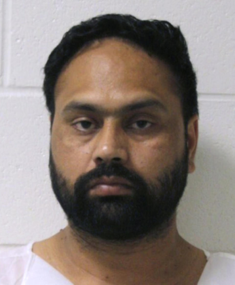 FILE - This booking photo released by the Branford Police Department shows Gurpreet Singh, arrested Tuesday, July 2, 2019, in Branford, Conn. Butler County Jail records show Singh was booked into the jail early Friday, Aug. 2, after his return from Connecticut. The grand jury indictments were made public nearly eight hours later. Singh has been indicted on four counts of aggravated murder in the slayings of his wife, her parents and her aunt in an apartment home in southwest Ohio.(Branford Police Department via AP)