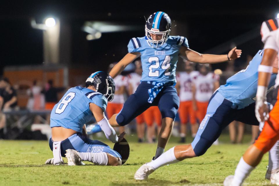 Kicker Peyton Woodring as The Ascension Blue Gators take on the Delcambre Panthers.  Friday, Oct. 23, 2020.