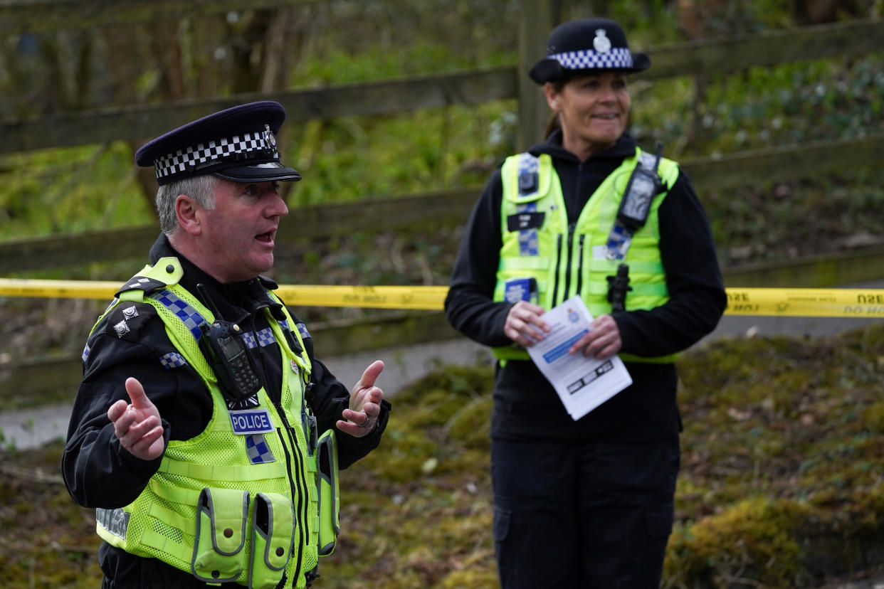 AYSGARTH FALLS, UNITED KINGDOM - MARCH 28: Inspector Mark Gee (L) briefs officers from North Yorkshire Police and Park Rangers from the Dales National Park ahead of an operation to reinforce the importance of social distancing and staying at home at the Aysgarth Falls National Park Visitor Centre which is closed to the public as the UK adjusts to life under the Coronavirus pandemic on March 28, 2020 in Aysgarth Falls, United Kingdom. New police powers to enforce the coronavirus lockdown will allow officers to use force to make people return home if they are in break of emergency laws. Coronavirus (COVID-19) has spread to at least 199 countries, claiming over 27,000 lives and infecting more than 597,000 people. There have now been 14,543 diagnosed cases in the UK and 759 deaths. (Photo by Ian Forsyth/Getty Images)