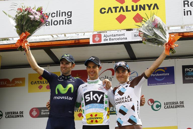 Movistar's Alejandro Valverde (L), Team Sky's Richie Porte (C) and Ag2r La Mondiale's Domenico Pozzovivo (R) celebrate on the podium after the last stage of the Tour of Catalonia on March 29, 2015