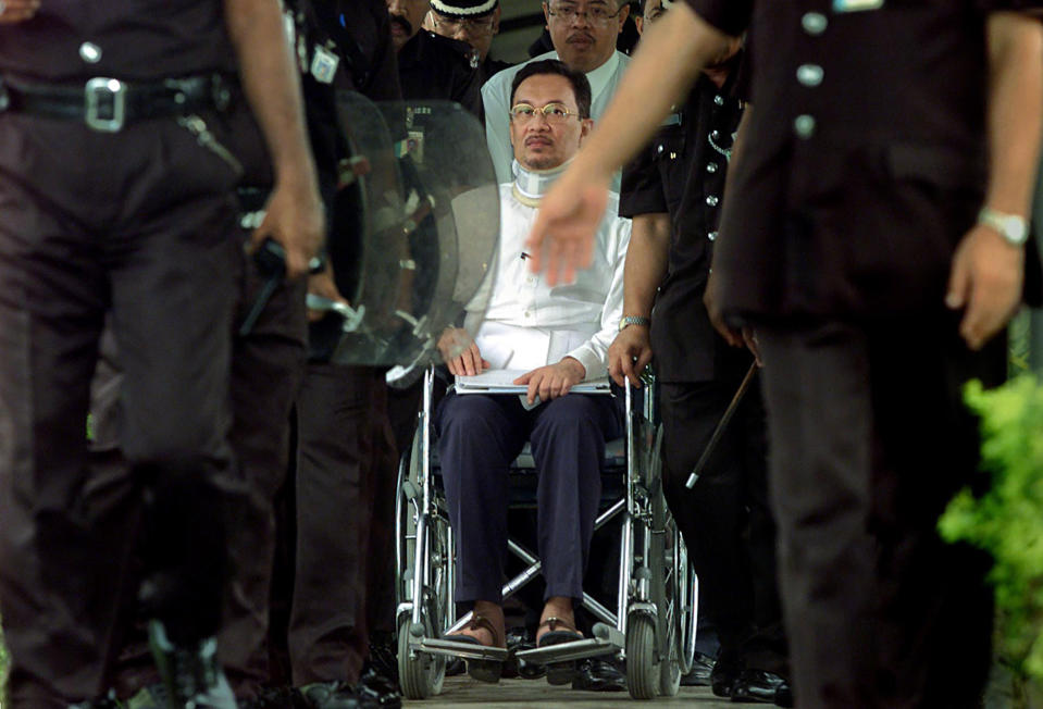 Anwar Ibrahim at Sungai Buloh Prison on May 12, 2001. Anwar was sacked as deputy PM in 1998 and indicted on abuse of power and sodomy charges he says were made up after a clash with Prime Minister Mahathir Mohamad. His convictions were overturned and pardoned, and he became Prime Minister in 2022.<span class="copyright">Reuters</span>