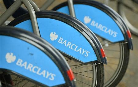 Bicylces for hire, sponsored by Barclays, are lined up in a rack in London October 30, 2013. REUTERS/Toby Melville