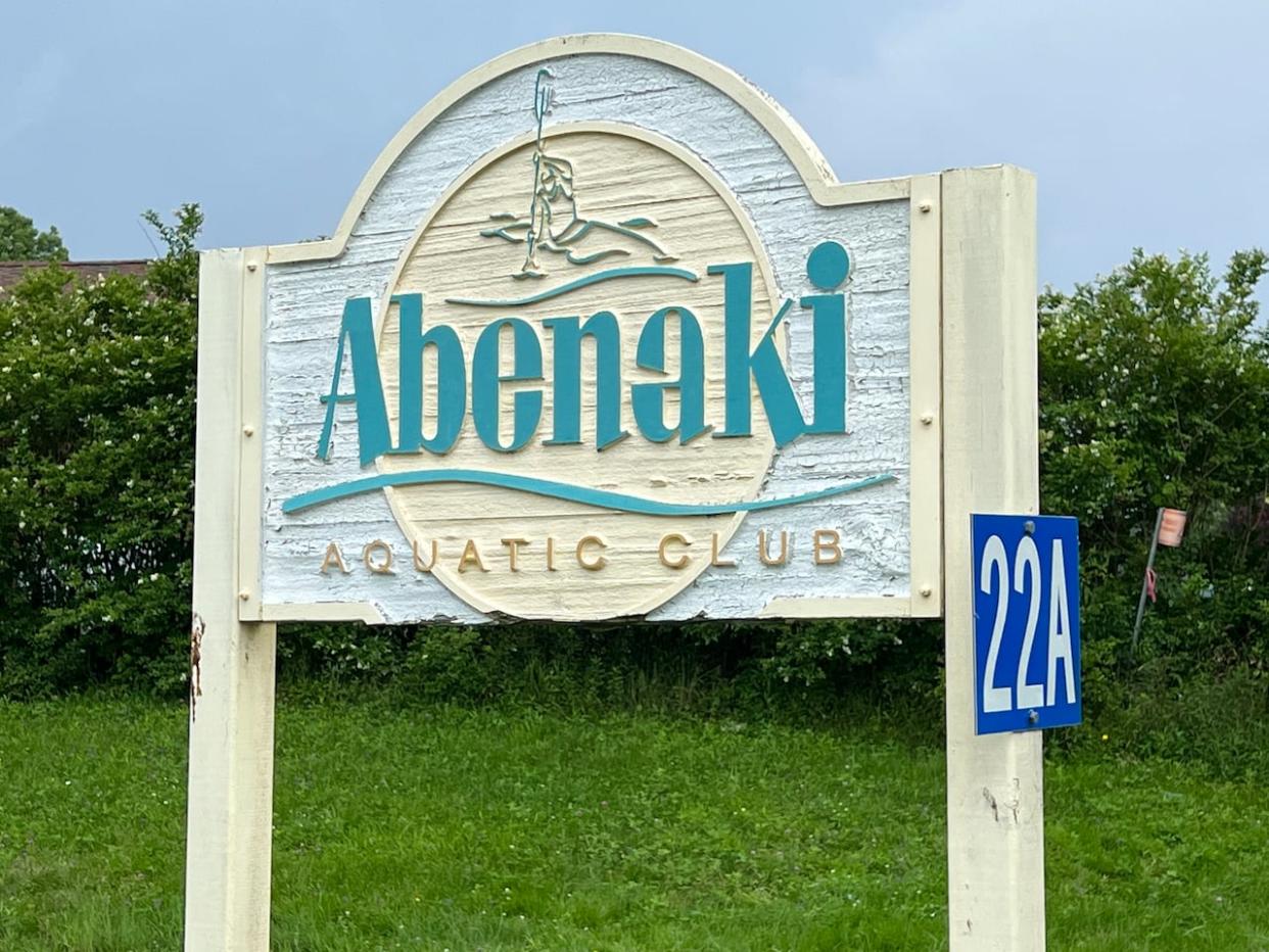 A sign outside the Abenaki Aquatic Club on Bell Lake in Dartmouth, N.S. (Mark Crosby/CBC - image credit)