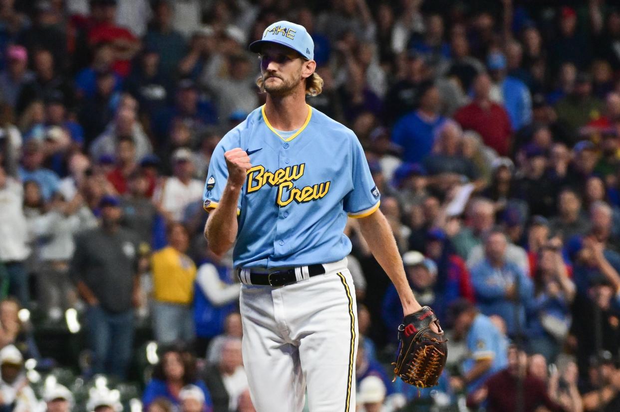 Milwaukee Brewers pitcher Caleb Boushley (57) reacts after pitching out of a jam in the tenth inning against the Chicago Cubs at American Family Field on September 29, 2023 in Milwaukee, Wis.