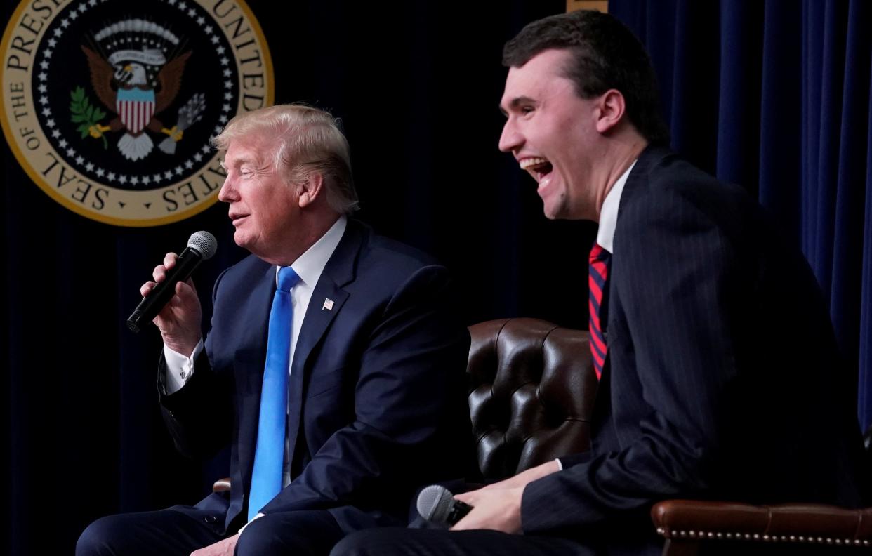 Turning Point USA&nbsp;founder&nbsp;Charlie Kirk&nbsp;laughs after President Donald Trump&nbsp;says at a White House youth forum on March 22 that if he could go back in time and give himself advice at age 25, it would be to not run for president. (Photo: Jonathan Ernst / Reuters)