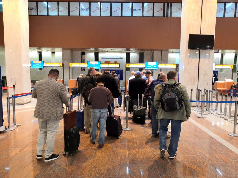 Foreign employees of oil companies, are seen leaving Iraq at the airport of Basra