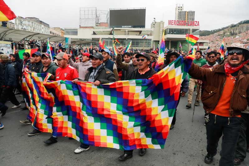 Supportes of ousted Bolivian President Evo Morales take part in a rally in La Paz