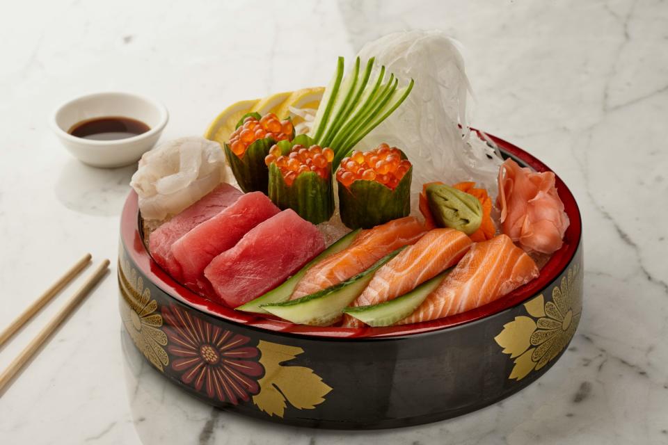 Japan has intriguing culinary offerings that travelers should enjoy in the springtime. 
pictured: a bowl of fresh Japanese sashimi 
