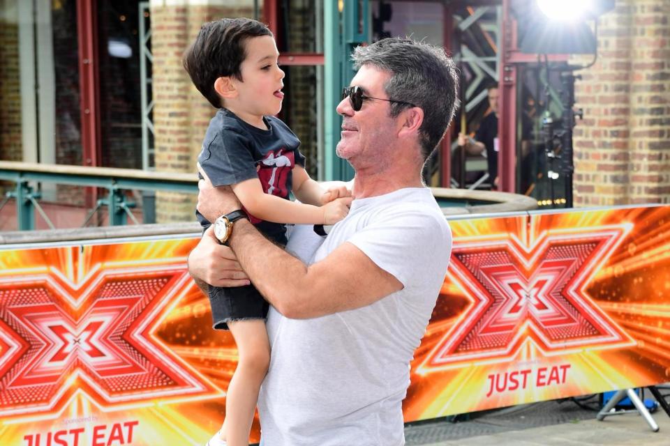 Simon Cowell and his son Eric (Ian West/PA Archive/PA Images)