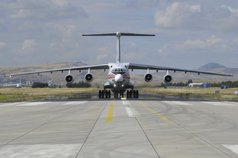 A Russian transport aircraft, carrying parts of the S-400 air defense systems, lands at Murted military airport in Ankara, Turkey, Friday, July 12, 2019. The first shipment of a Russian missile defense system has arrived in Turkey, the Turkish Defense Ministry said Friday, moving the country closer to possible U.S. sanctions and a new standoff with Washington. The U.S. has strongly urged NATO member Turkey to pull back from the deal, warning the country that it will face economic sanctions. (Turkish Defence Ministry via AP, Pool)