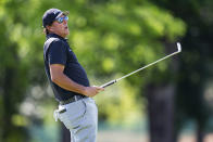 Phil Mickelson reacts after a putt on the fourth hole during the first round of the Wells Fargo Championship golf tournament at Quail Hollow on Thursday, May 6, 2021, in Charlotte, N.C. (AP Photo/Jacob Kupferman)