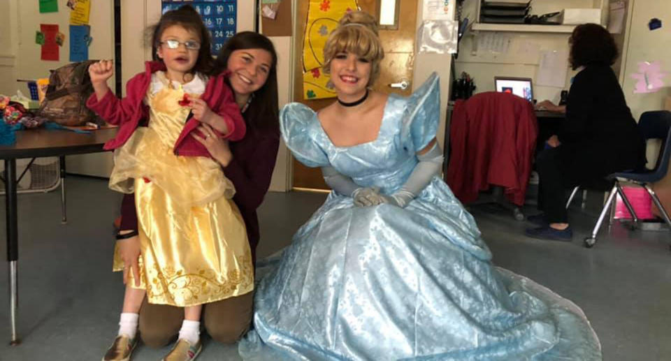 Morey Belanger, from Maine, with a teacher and a woman dressed up as Cinderella who also knew sign language. 