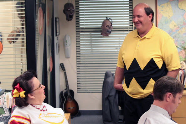 Kevin Malone wears Charlie Brown's black and yellow shirt.