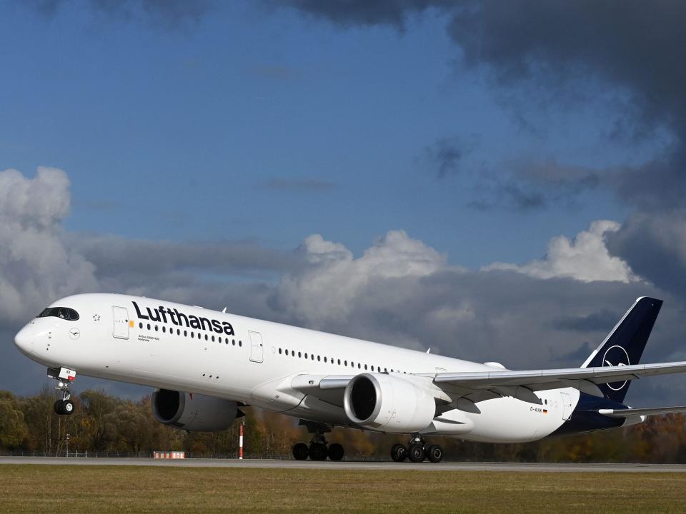 A Lufthansa Airbus A350 airplane taking off.