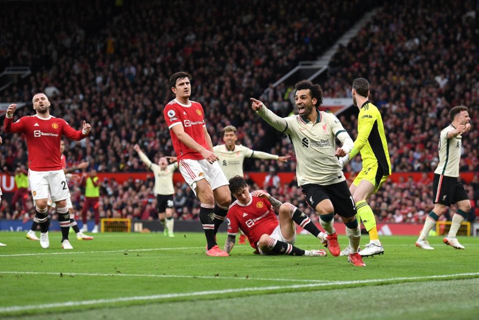 Mohamed Salah celebrates scoring Liverpool’s third – the first of his three goals (Getty Images)