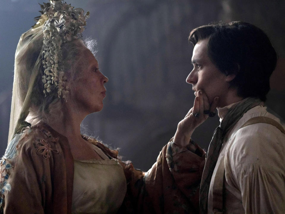 Olivia Colman as Miss Havisham and Fionn Whitehead as Pip in Great Expectations.