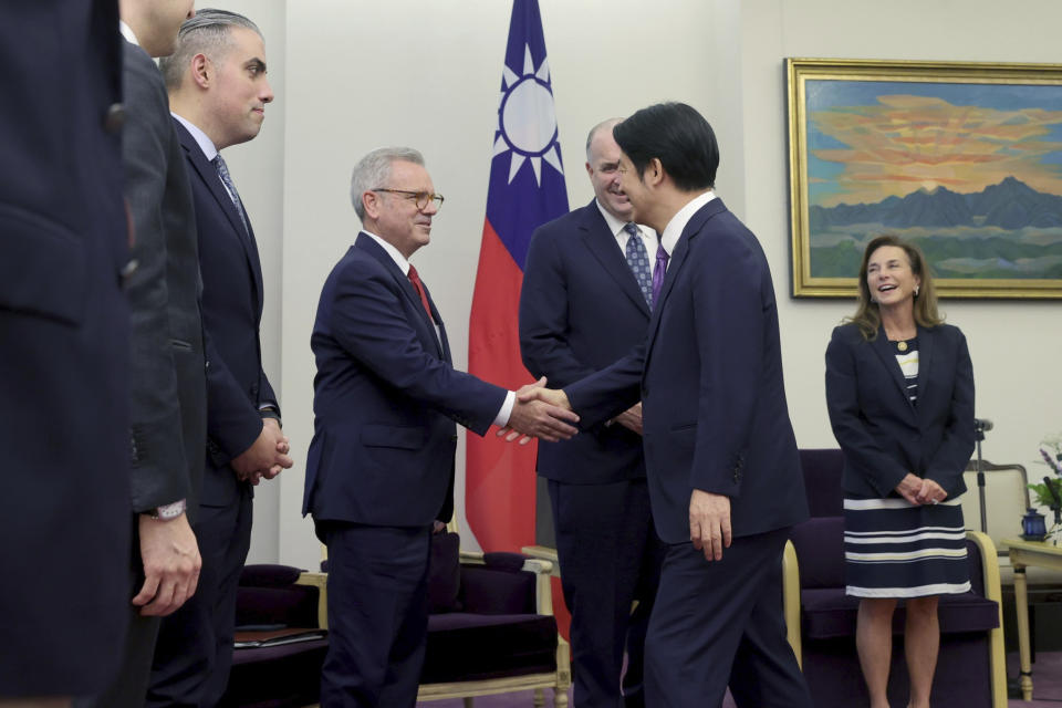 In this photo released by the Taiwan Presidential Office, Mark Alford, center left, a member of the House Armed Services Committee shakes hands with Taiwan President-elect and Vice President Lai Ching-te in Taipei, Taiwan on Tuesday, April 23, 2024. Lisa McClain, secretary-general of the Republican Caucus of the U.S. House of Representatives and Democratic Congressman Dan Kildee jointly led a cross-party group of lawmakers to visit Taiwan from April 23 to 25 . Members also include Mark Alford, a member of the House Armed Services Committee. (Taiwan Presidential Office via AP)