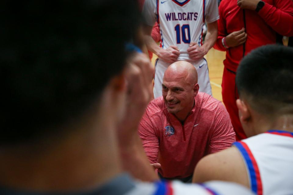 Gregory-Portland head boys basketball coach Sean Armstrong speaks to the team between periods during the District 29-5A championship on Tuesday, Feb. 13, 2024, in Corpus Christi, Texas.