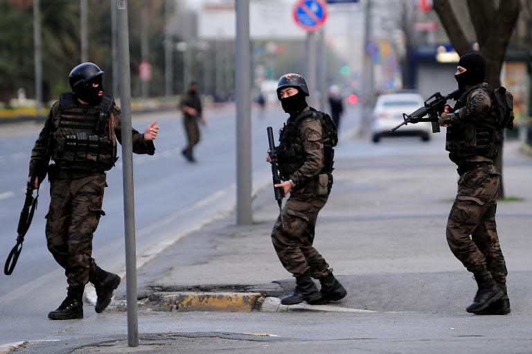 Turkish special forces take position on April 1, 2015 near the police headquarters in Istanbul