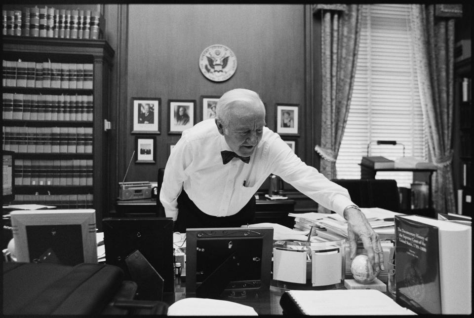 Justice John Paul Stevens works in his chambers at the Supreme Court on June 17, 2002, in Washington.