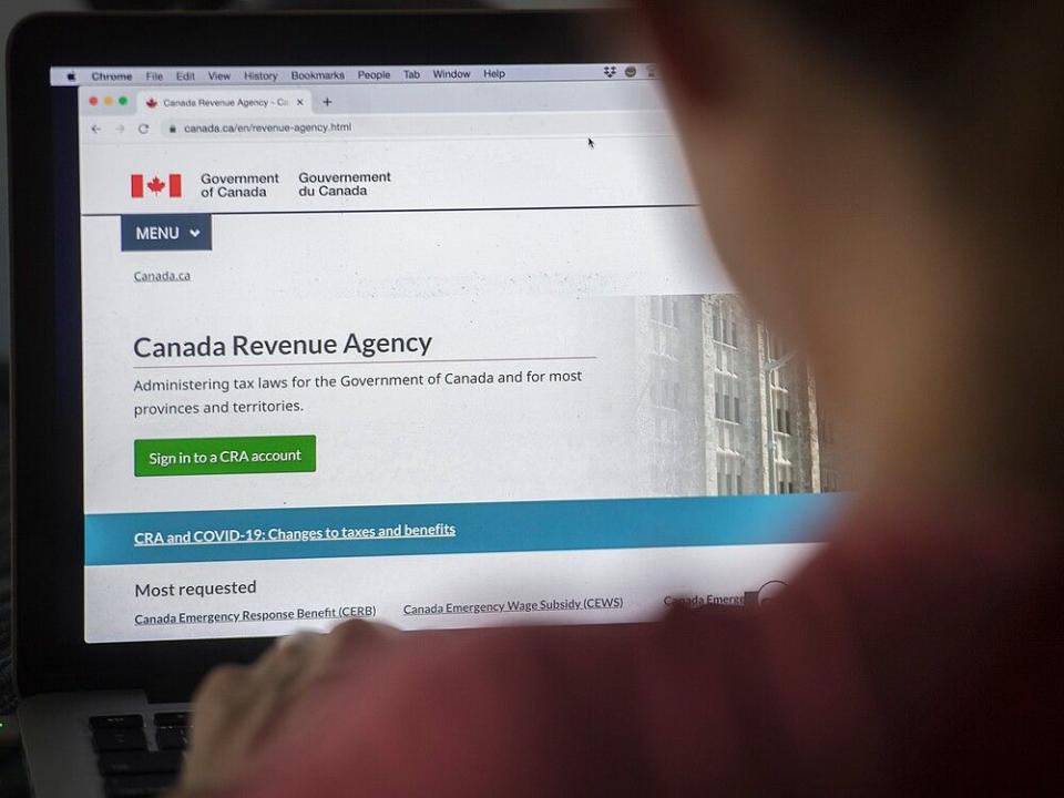  A person looks at the Canada Revenue Agency homepage in Montreal.