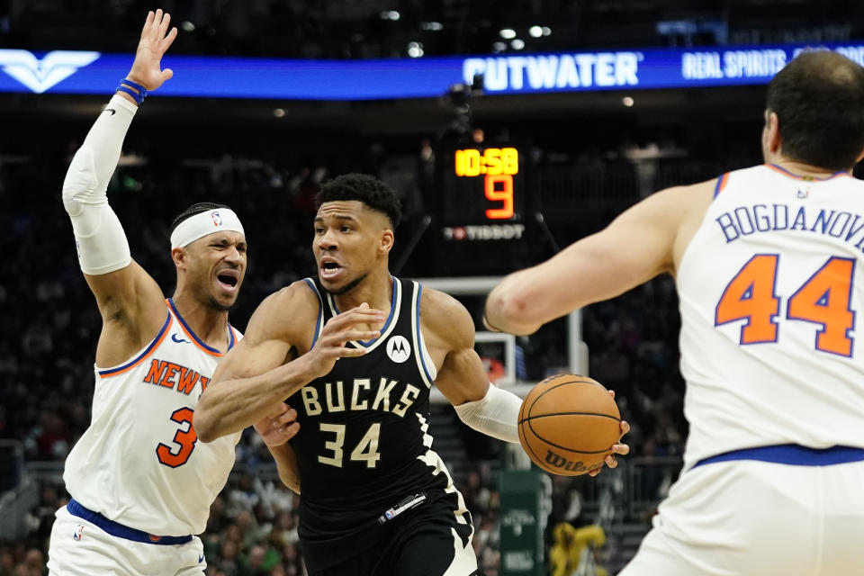 Milwaukee Bucks' Giannis Antetokounmpo (34) drives to the basket against New York Knicks' Josh Hart (3) during the second half of an NBA basketball game Sunday, April 7, 2024, in Milwaukee. (AP Photo/Aaron Gash)