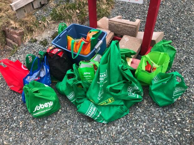 The students from St. John Bosco collected food for two weeks to donate to the Little Free Pantry.