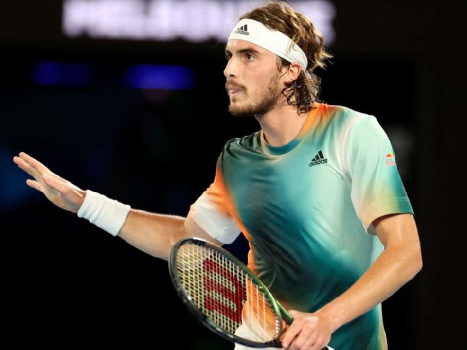 Stefanos Tsitsipas reacts during his semi-final defeat  (AFP via Getty Images)