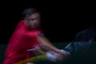 CORRECTS NAME OF PLAYER Croatia's Borna Gojo returns the ball to Russian Tennis Federation's Andrey Rublev during their Davis Cup tennis finals at Madrid Arena in Madrid, Spain, Sunday, Dec. 5, 2021. (AP Photo/Manu Fernandez)