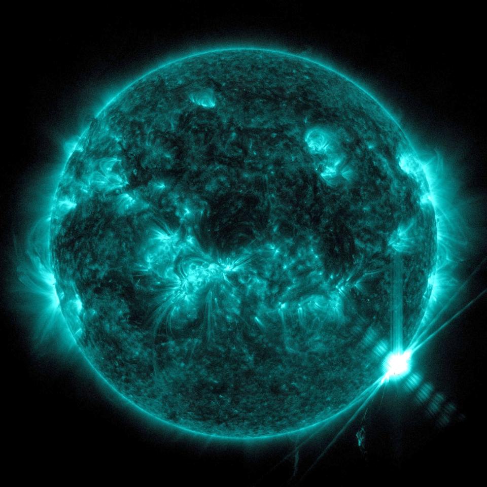 NASA’s Solar Dynamics Observatory captured this image of a solar flare –the bright flash on the lower right – on Feb. 9.