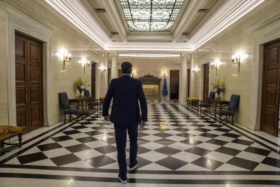 Greece's Prime Minister and New Democracy leader Kyriakos Mitsotakis arrives at his office in Maximos Mansion during the election campaign in Athens, Greece, Tuesday, May 9, 2023. (AP Photo/Thanassis Stavrakis)