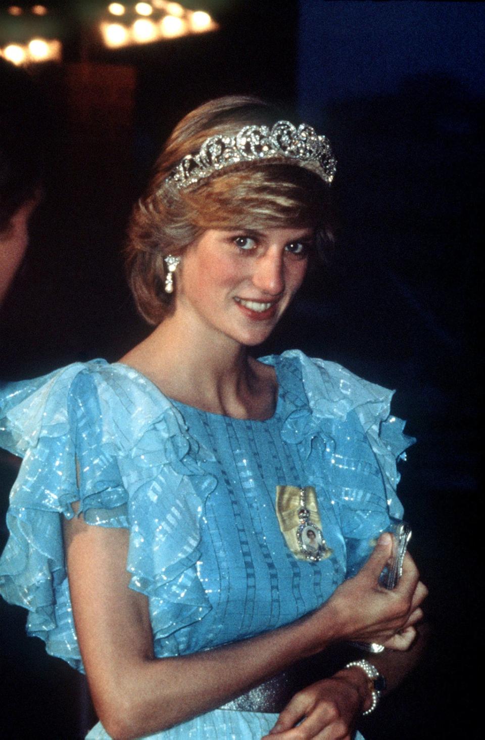 Diana, Princess of Wales, wearing the Spencer family tiara attending a state dinner during a tour to Canada in 1983 (PA) (PA Archive)