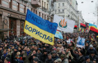 Supporters of former Georgian president and Ukrainian opposition figure Mikheil Saakashvili march on a street in Kiev, Ukraine December 17, 2017. REUTERS/Valentyn Ogirenko