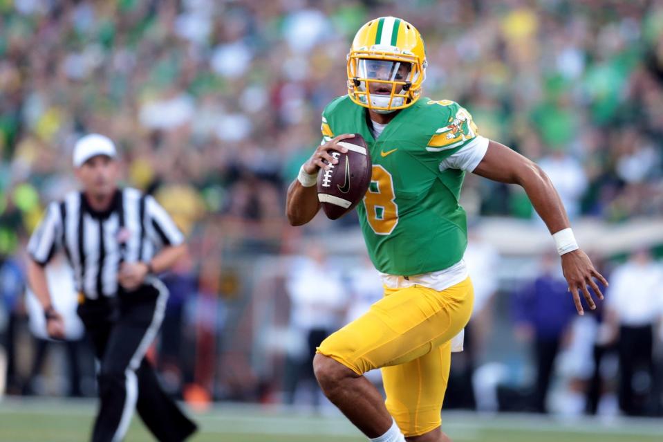 Oct 18, 2014; Eugene, OR, USA; The Oregon Ducks last wore their throwbacks in a 2014 game against the Washington Huskies at Autzen Stadium. Mandatory Credit: Scott Olmos-USA TODAY Sports