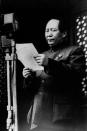 FILE - In this Oct. 1, 1949, file photo, Mao Zedong stands in Tiananmen Square in Beijing, declaring a New China. (AP Photo, File)