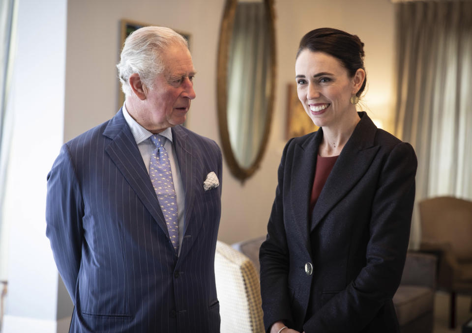 Britain's Prince Charles talks with New Zealand Prime Minister Jacinda Ardern at Government House in Auckland, New Zealand, Tuesday, Nov. 19, 2019. Prince Charles and his wife Camilla are on a weeklong trip, during which they plan to visit the city of Christchurch and the historic treaty grounds at Waitangi, where the nation's founding document was signed.(Patrice Allen/Pool Photo via AP)