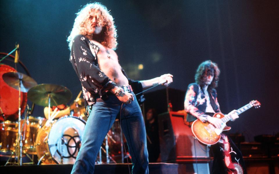 Plant performs with Led Zeppelin guitarist Jimmy Page - Shutterstock