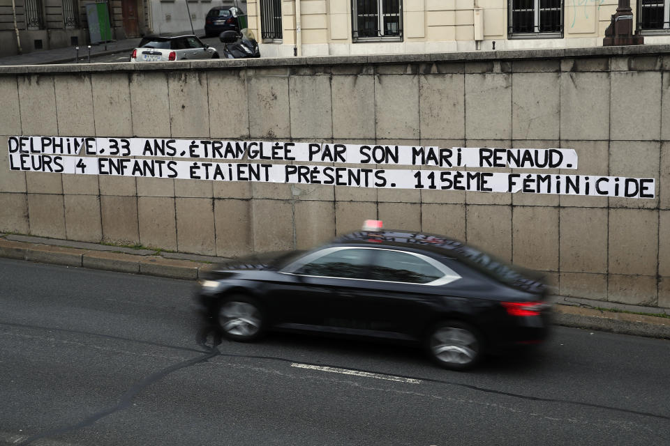 Posters read "Delphine, 33, strangled by her husband Reanud. Their four children were present. 115th feminicide" in Paris, Wednesday, Nov. 6, 2019. France, a country that has prided itself on gender equality, is beginning to pay serious attention to its yet-intractable problem of domestic violence. (AP Photo/Francois Mori)