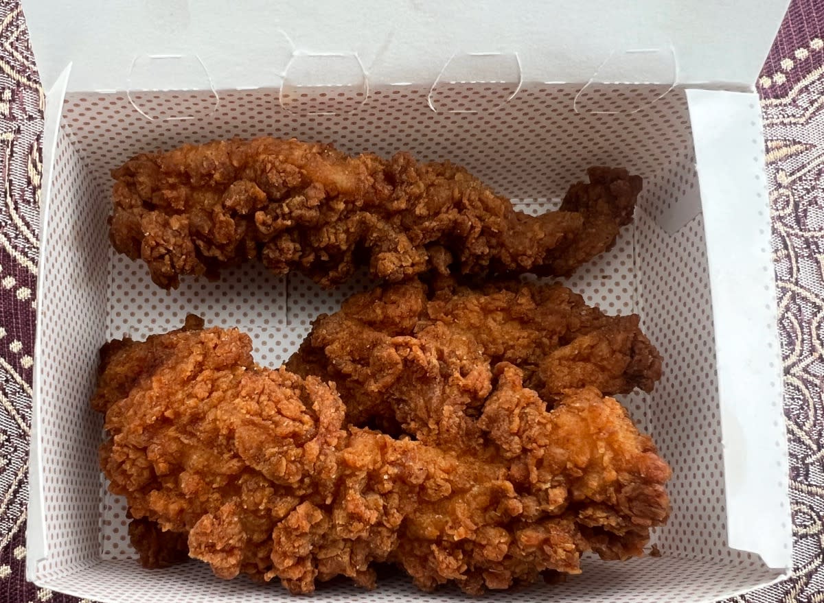 chick-fil-a chicken strips in a takeout container.