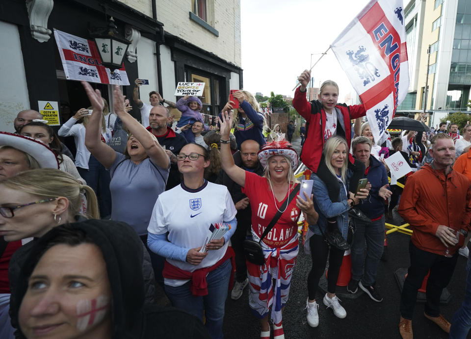 FILE - English fans wait in front of the Bramall Lane Stadium prior the Women Euro 2022 semi final soccer match between England and Sweden in Sheffield, England, Tuesday, July 26, 2022. (AP Photo/Jon Super, File)