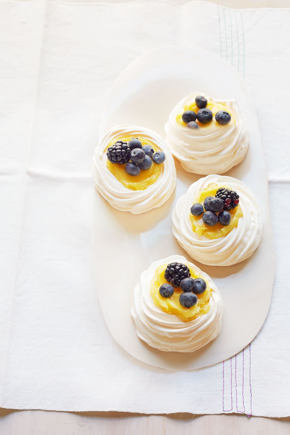 Lemon-Berry Meringue Nests