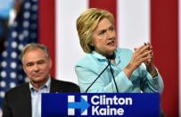 US Democratic Presidential candidate Hillary Clinton introduces her running mate US Senator Tim Kaine at a campaign rally in Miami on July 23, 2016