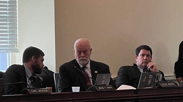 At right, Del. Chris Adams, R-Caroline/Dorchester/Talbot/Wicomico, listens during testimony before the Economic Matters Committee on Feb. 1, 2024 in Annapolis. At left, Del. Jesse Pippy, R-Frederick, turns to speak to Del. Steve Arentz, R-Upper Eastern Shore.