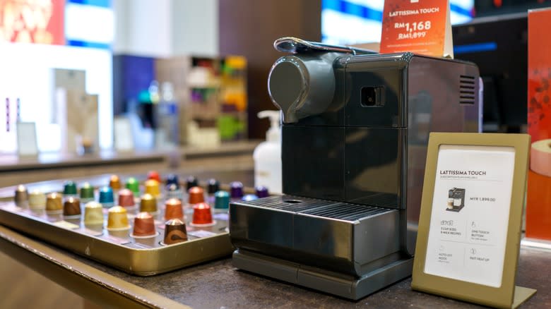 nespresso machine and pods on display